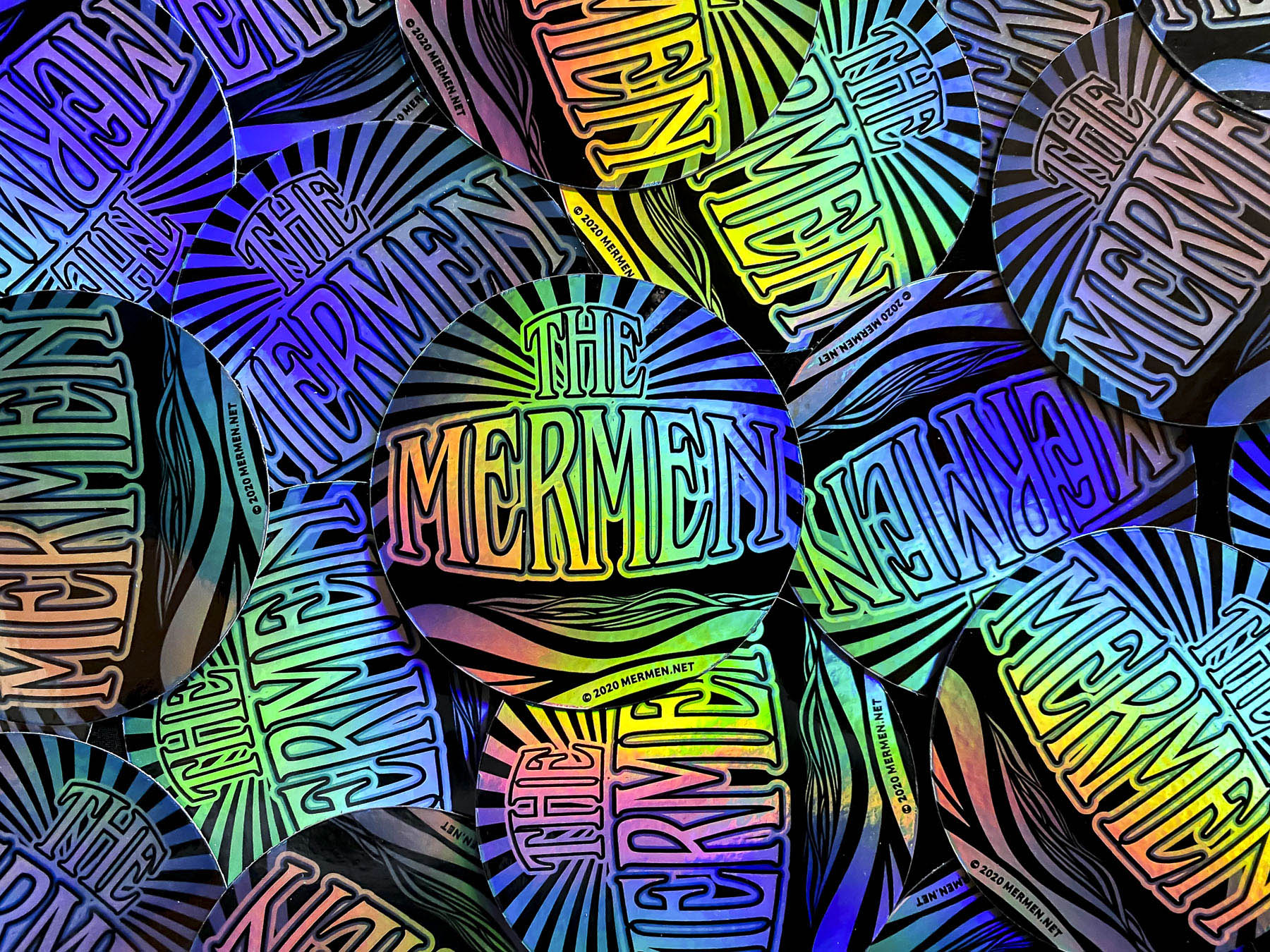 The Mermen Holographic Stickers. Sticker design and photo by emi