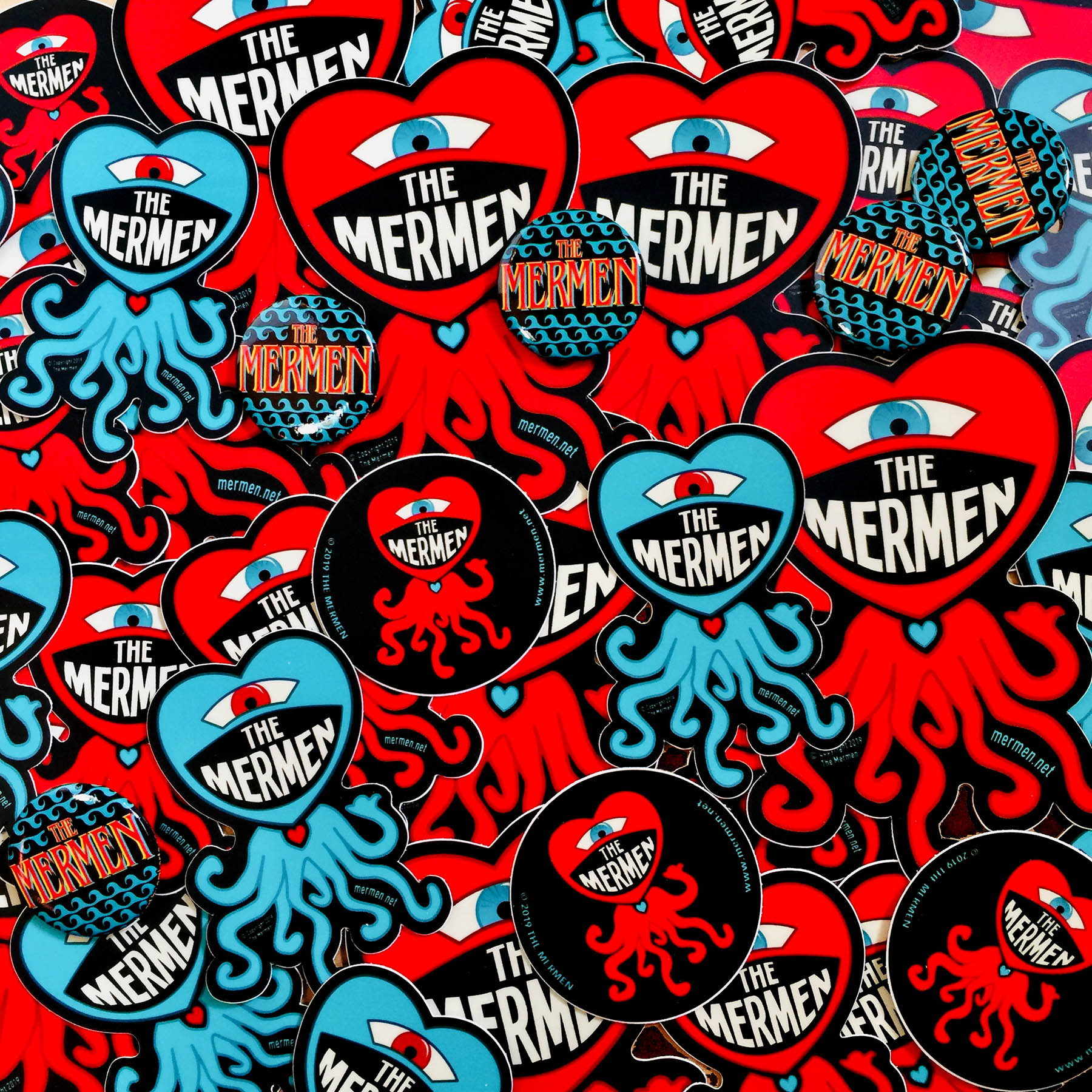 The Mermen Stickers and Buttons. Sticker and button design by em. photo by emi